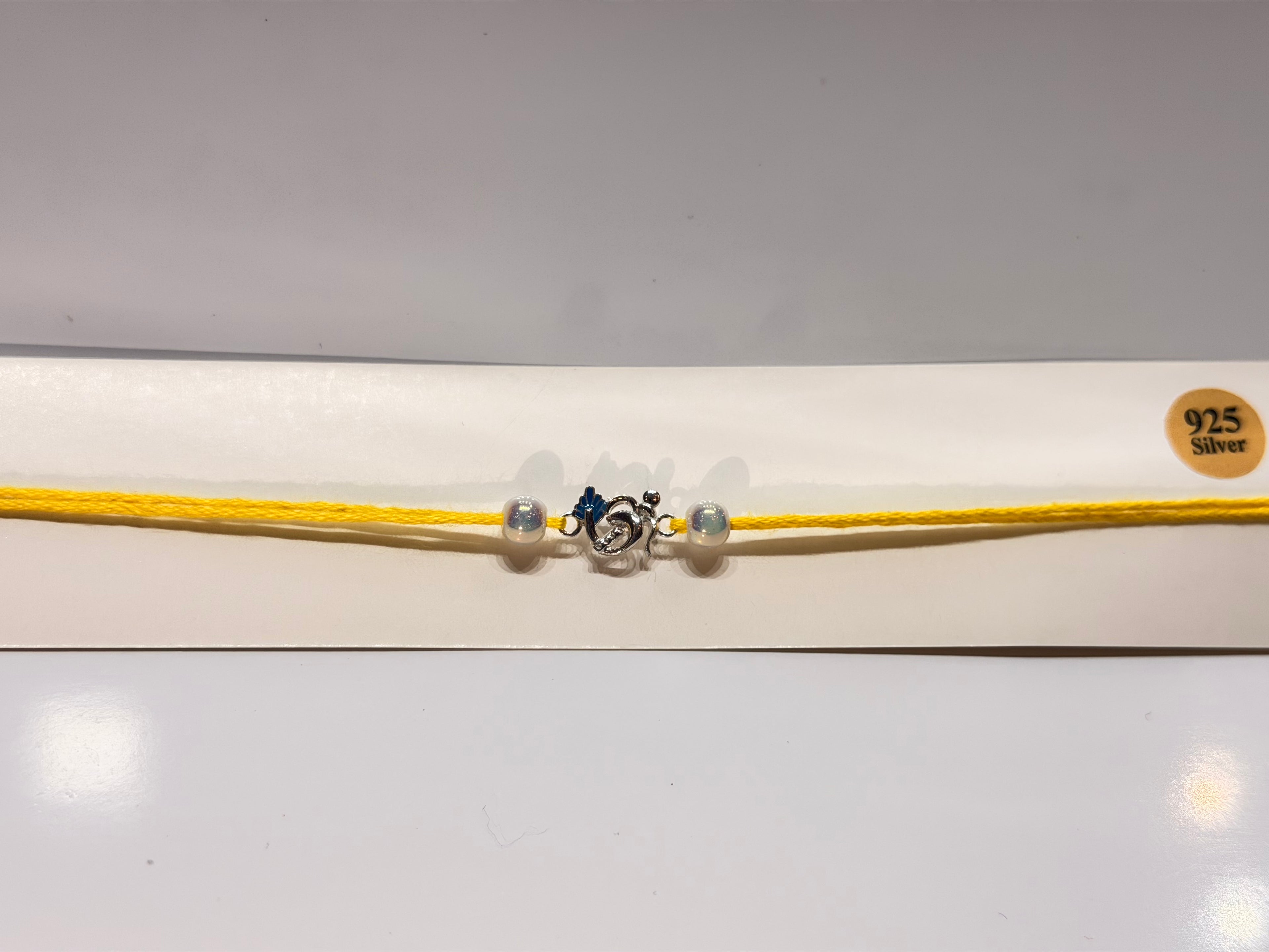 Fancy Om Rakhi