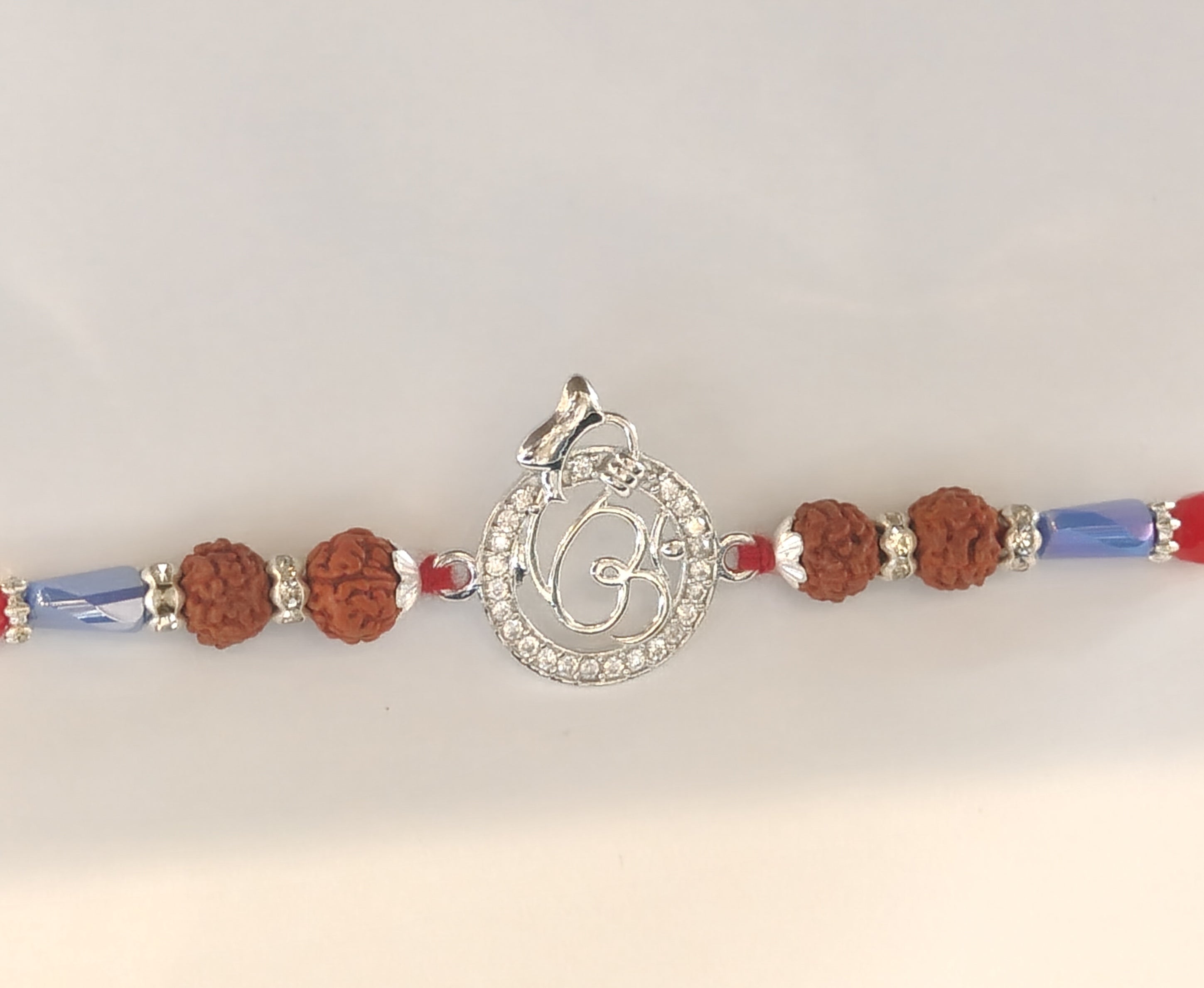 Silver Om Rakhi